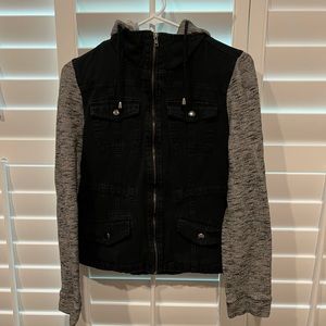 Black Jean jacket with a hood.